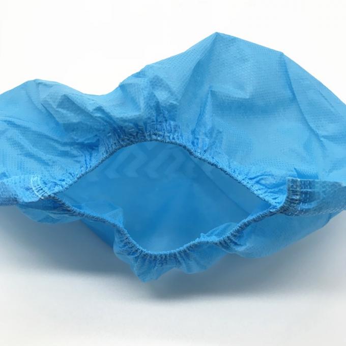 Não a sapata descartável do deslizamento cobre a prova fluida do Pe azul da cor automática